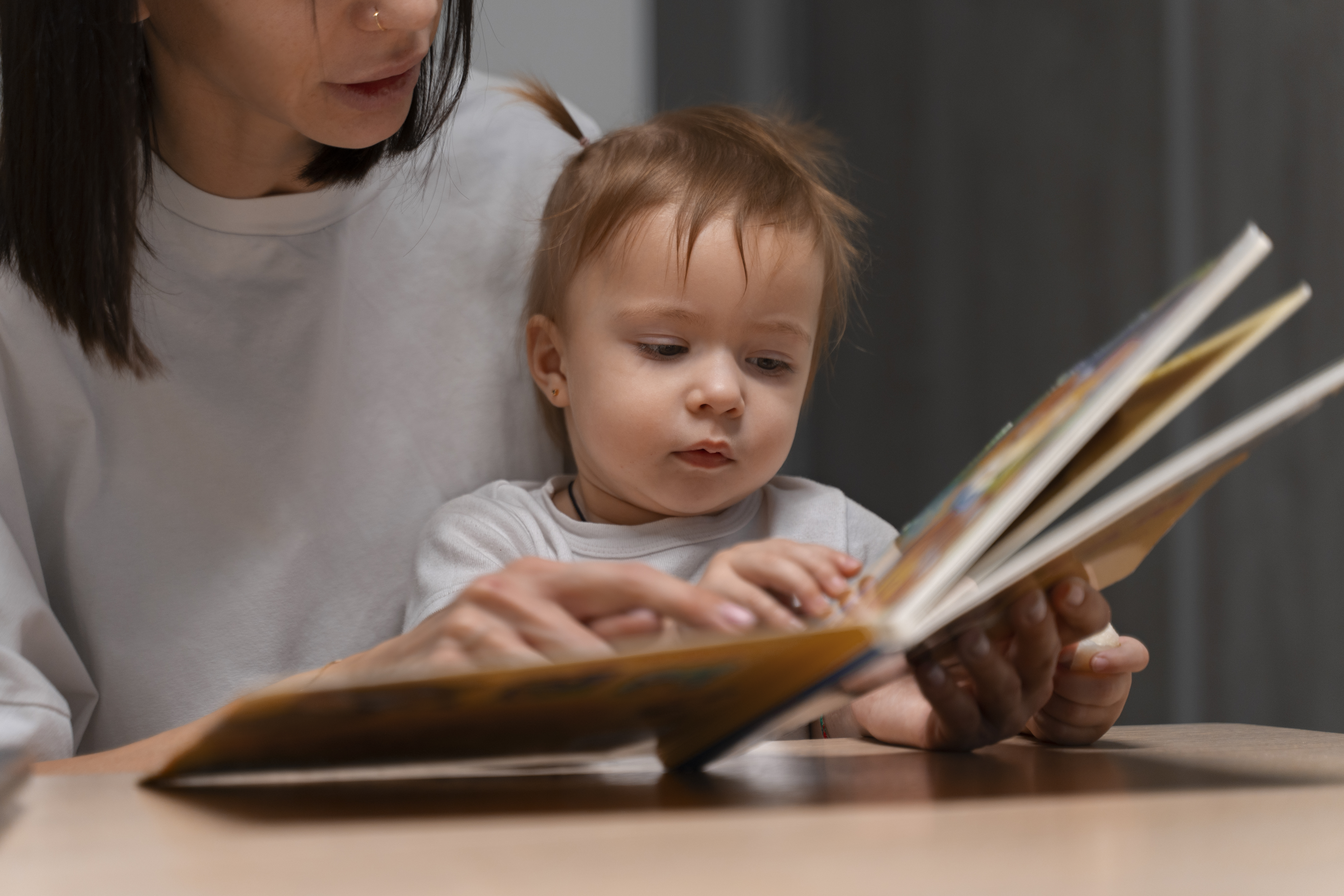 front-view-mother-baby-with-book.jpg